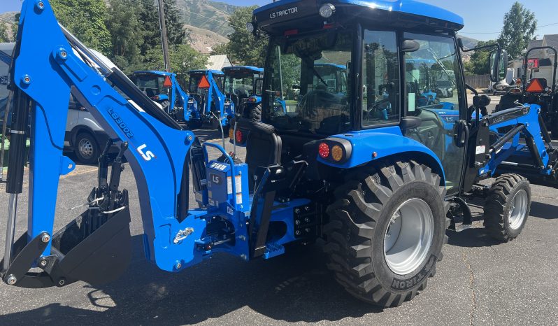 MT 242 loader backhoe Premium Cab full