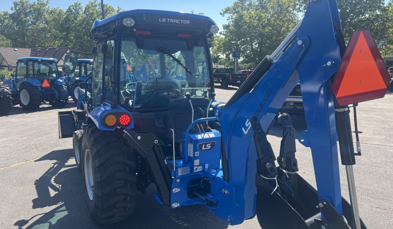 MT 242 loader backhoe Premium Cab full